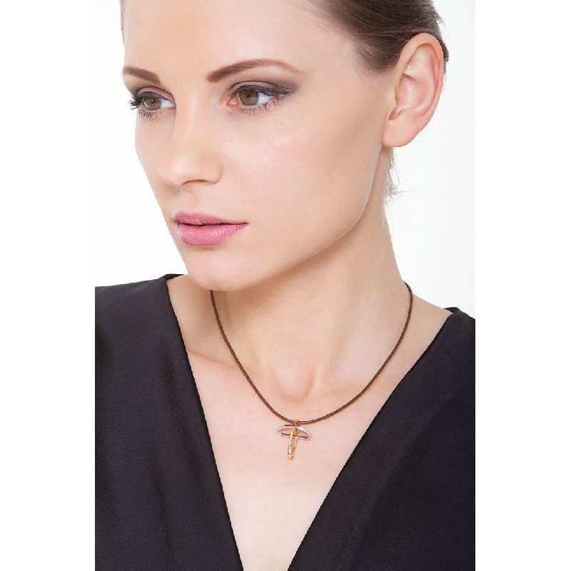 Rounded cross in 18k yellow and white gold