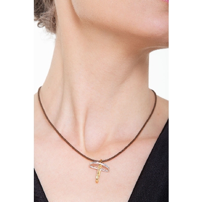 Rounded cross in 18k yellow and white gold