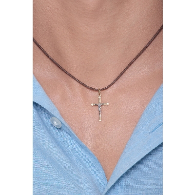 Silhuette cross and Jesus pendant in 18k yellow and white gold 