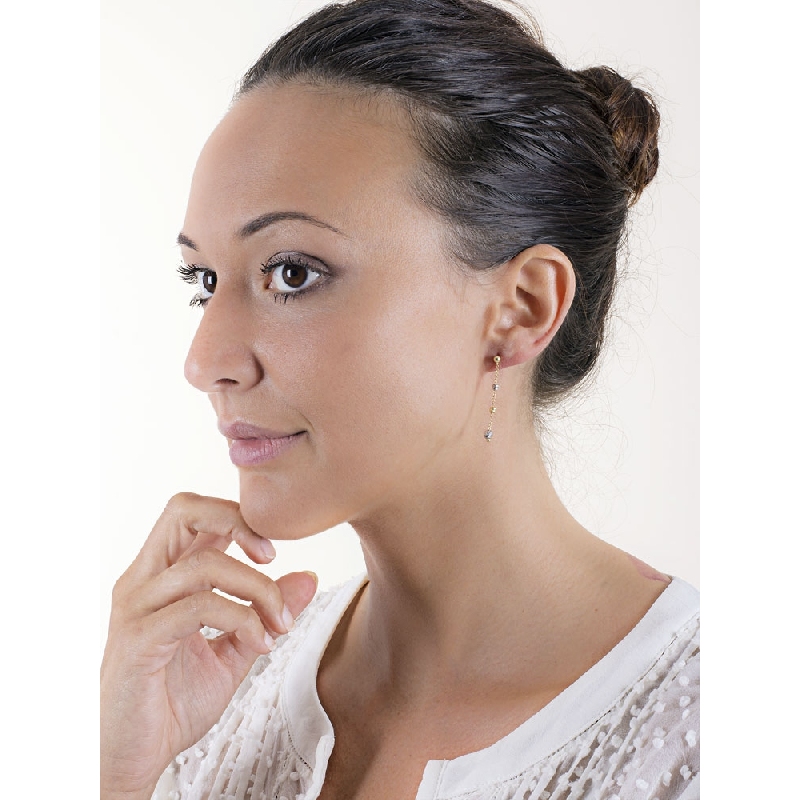 Earrings in white and yellow gold 18k with diamond cut pendants 