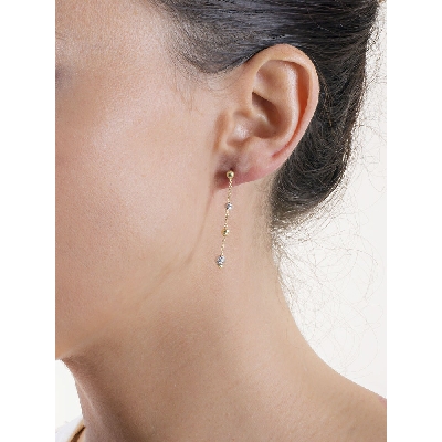 Earrings in white and yellow gold 18k with diamond cut pendants 