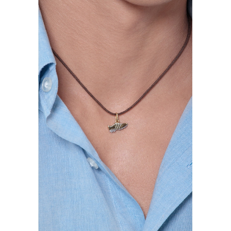 Ciondolo Scarpetta da calcio in oro giallo e bianco 18k