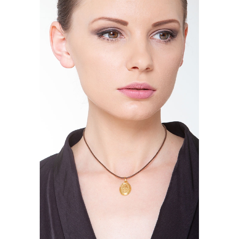 Medaglia sacra con Madonna in oro giallo 18k