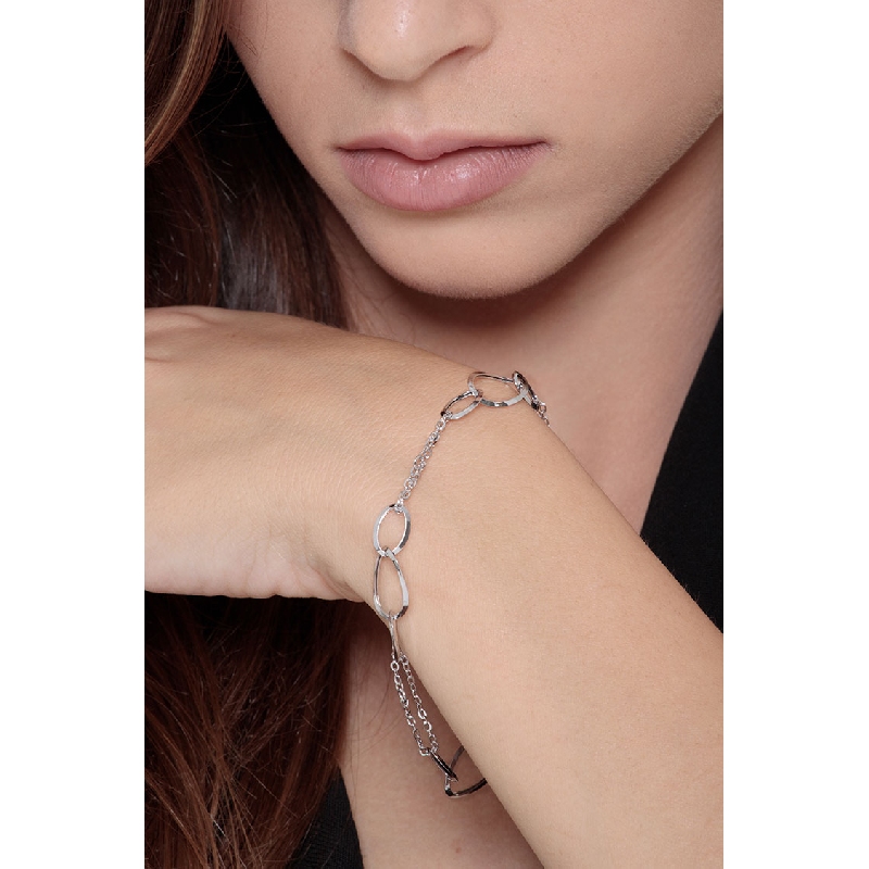 Fancy oval sections bracelet in 18k white gold