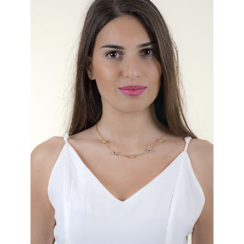 Catena con rotelle diamantate in oro giallo e oro bianco 18k
