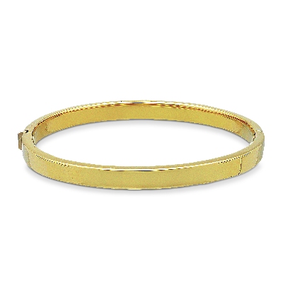 Bracciale rigido a canna vuota in oro giallo 18k.