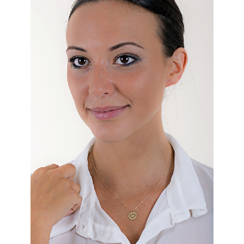 Perfored heart pendant in 18k yellow gold