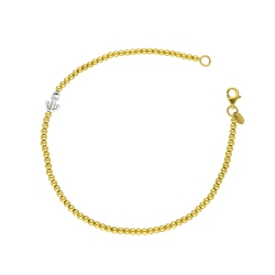 18k yellow and white gold bracelet with spheres and anchor charm