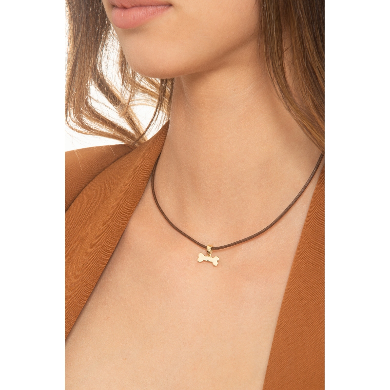 18k yellow gold charm with bone