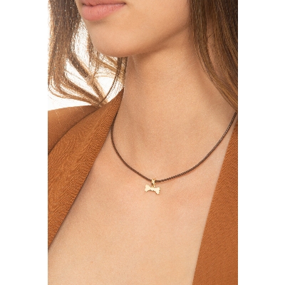18k yellow gold charm with bone