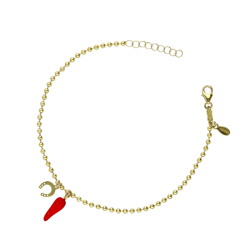 Bracciale in oro giallo 18k con cornetto rosso portafortuna e ferro di cavallo