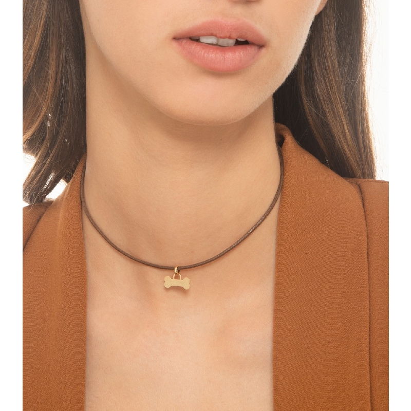 18k yellow gold charm with bone