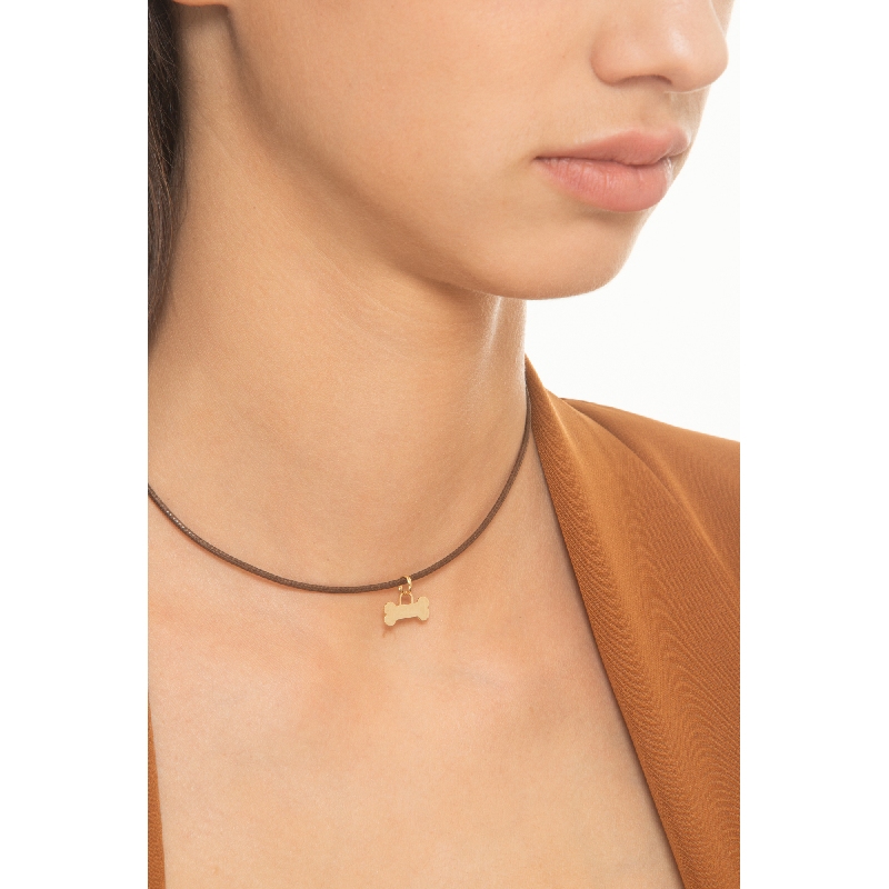 18k yellow gold charm with bone