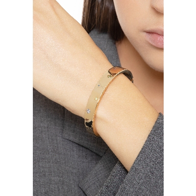 Bracciale rigido in oro giallo 18k con zirconi colorati.