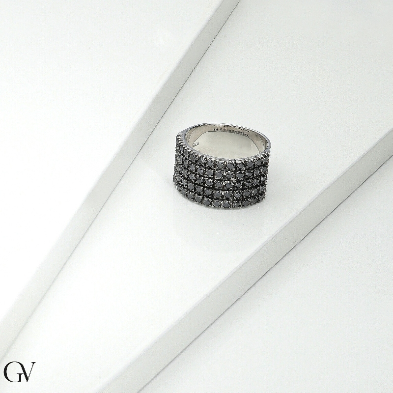 18k white gold ring with black diamonds and burnished tips 