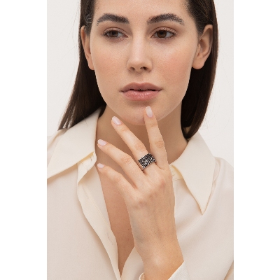 18k white gold ring with black diamonds and burnished tips 