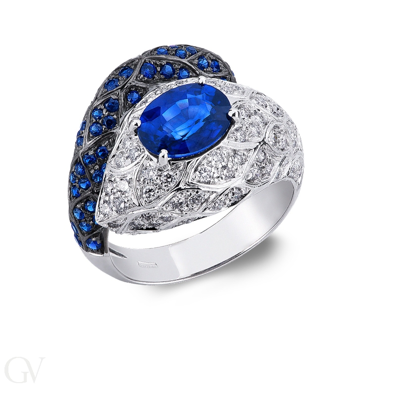 18k white gold snake ring with blue sapphires and diamonds 