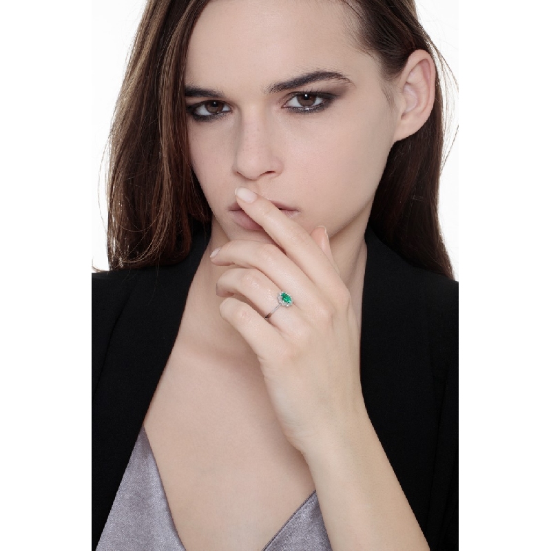 ANELLO CONTORNO CON 10BRILLANTI E SMERALDO OVALE MM7X5 CIRCA