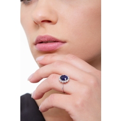 18k white gold halo ring with diamonds and a blue sapphire oval cut  2