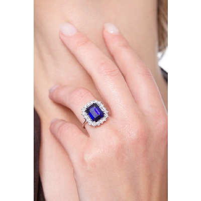 White gold 18k halo ring with blue sapphire emerald cut and diamonds 