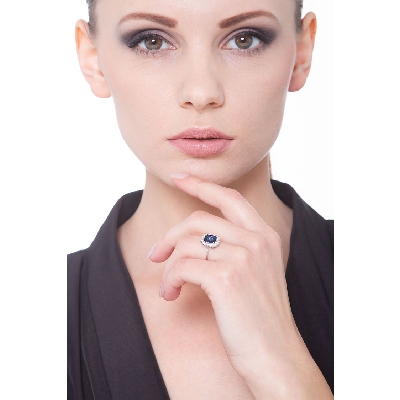 18k white gold halo ring with blue sapphires and diamonds 