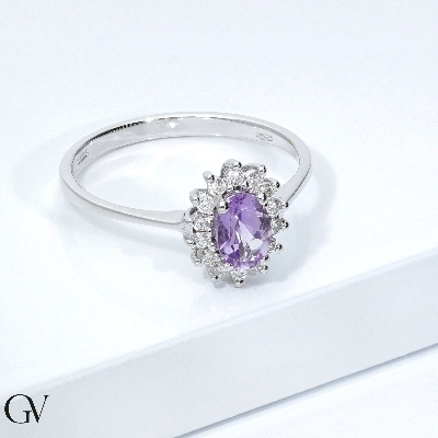 Halo ring with oval cut amethyst and diamonds 