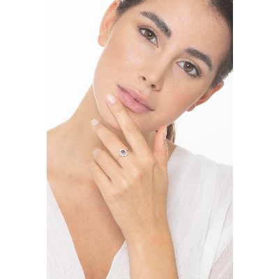 Halo ring with oval cut amethyst and diamonds 