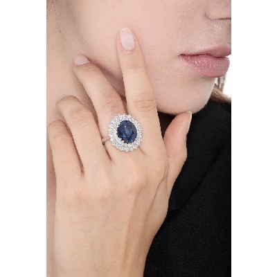 Diamond double halo ring with blue sapphire oval cut 