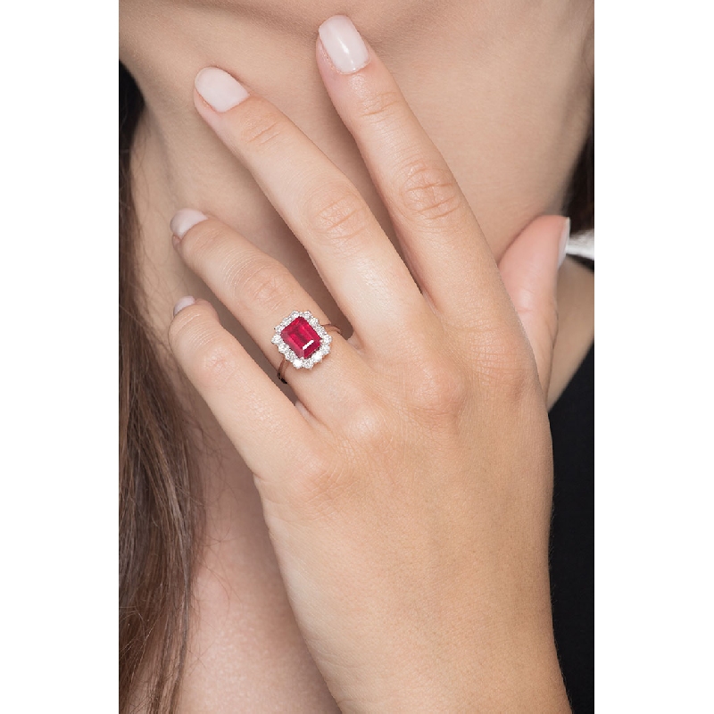 Halo ring with diamonds and ruby emerald cut white gold 18k