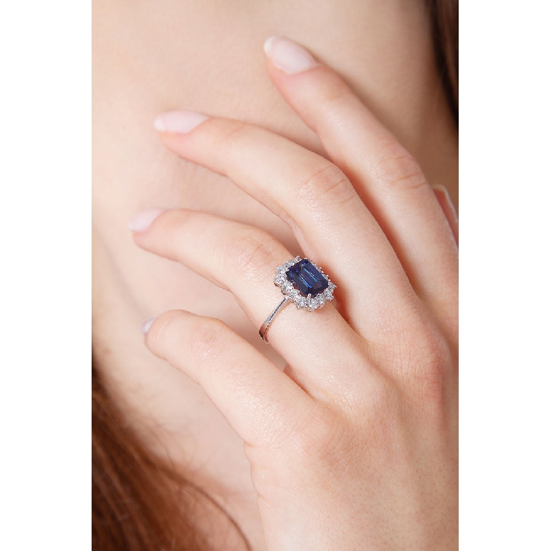 Halo ring white gold 18k with diamonds and blue sapphire emerald cut 