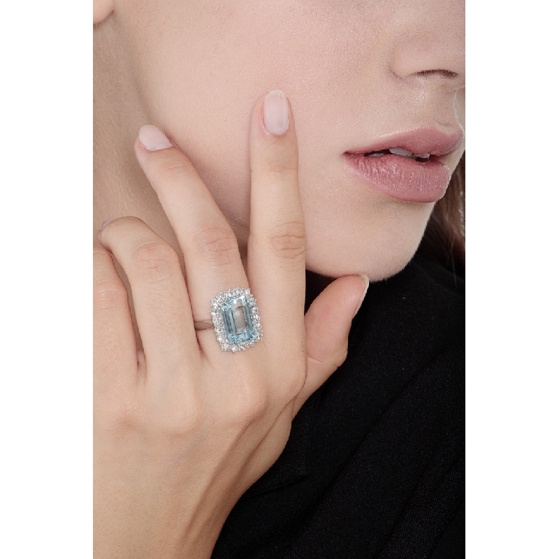 Halo ring white gold 18k with aquamarine emerald cut and diamonds 