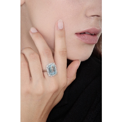 Halo ring white gold 18k with aquamarine emerald cut and diamonds 
