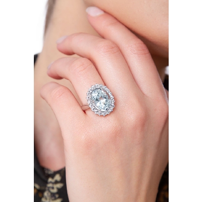 Halo ring with central acquamarine and diamonds white gold 18k 