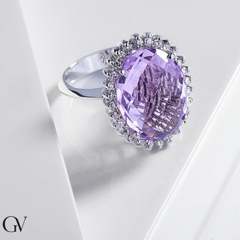 White gold 18k halo ring with central amethyst oval cut and diamonds 