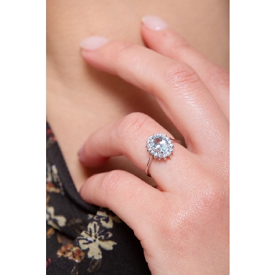 Halo ring with diamonds and aquamarine white gold 18k