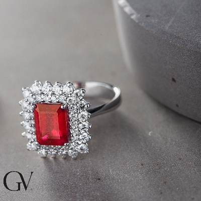 Diamond double halo ring with central ruby white gold 18k