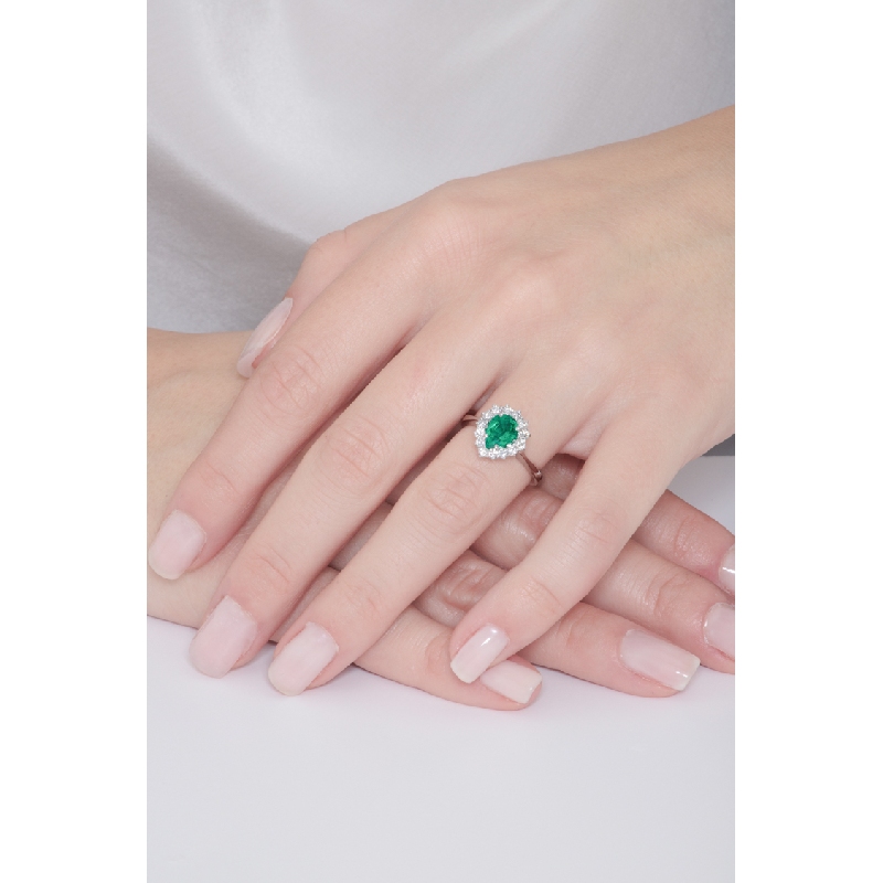 White gold 18k halo ring with diamonds and emerald 