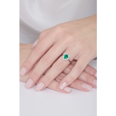 White gold 18k halo ring with diamonds and emerald 