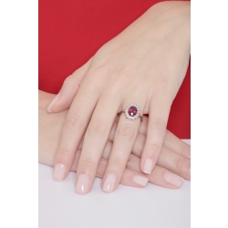 ANELLO CONTORNO CON RUBINO OVALE MM9X7 E 14BRILLANTI 2
