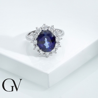 White gold 18k halo ring with blue sapphire and diamonds 
