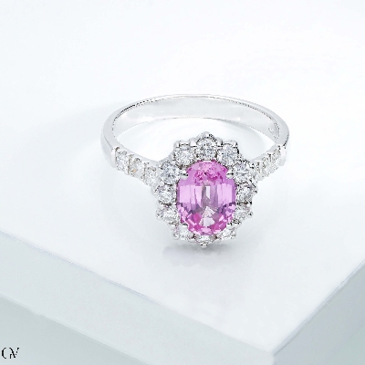 White gold 18k halo ring with diamonds and pink sapphire oval cut