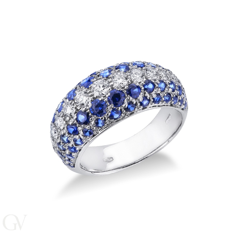 18k white gold ring with a central blue sapphire and diamonds 