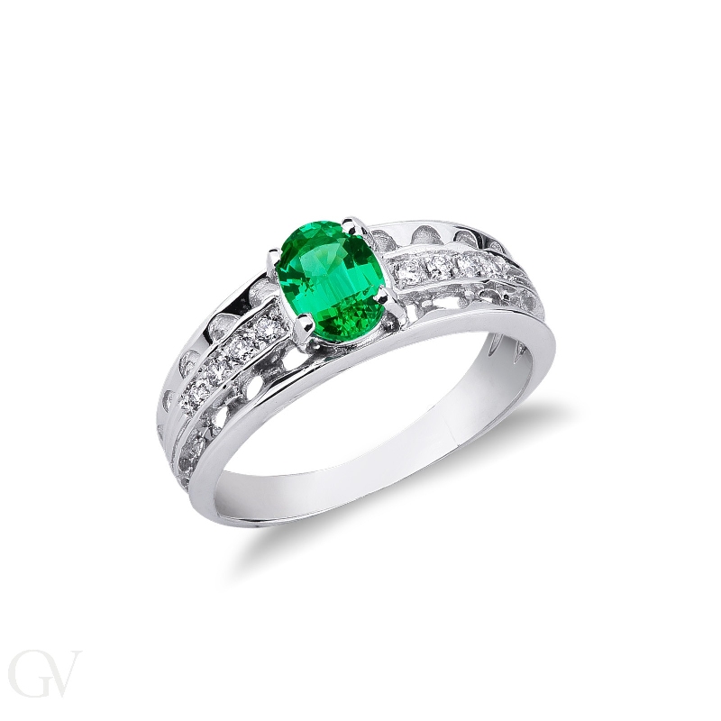 Ring with central emerald and diamonds in white gold 18k