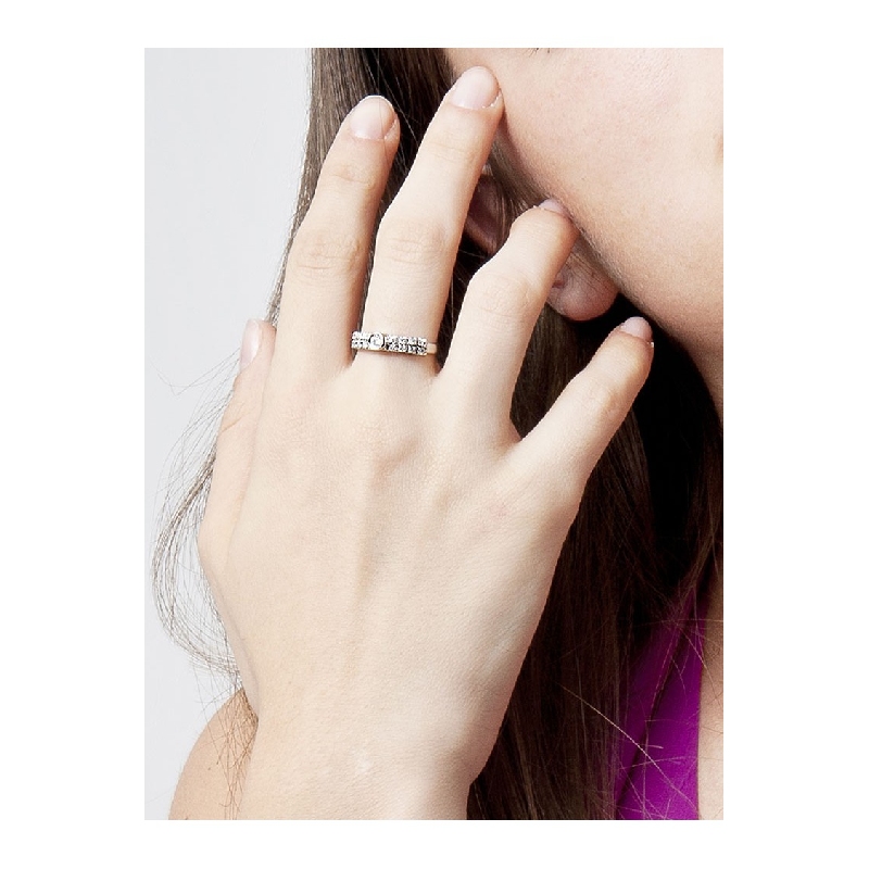 18k white gold half eternity ring with a central diamond and two rows of diamonds 