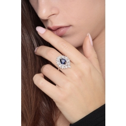 White gold 18k ring with a blue sapphire and halo diamonds  2
