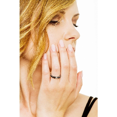 White gold 18k ring with one white diamond and black diamonds 