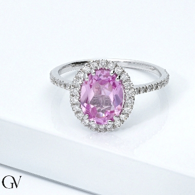 18k white gold halo ring with oval cut pink sapphire and diamond shoulder set