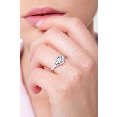 White gold 18k halo ring with diamonds central and shoulder set 