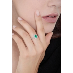 White gold 18k halo ring with emerald oval cut and diamonds  2