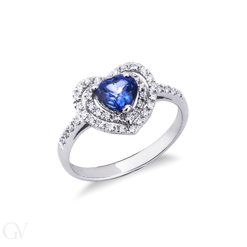 White gold 18k halo ring with diamonds and central blue sapphire